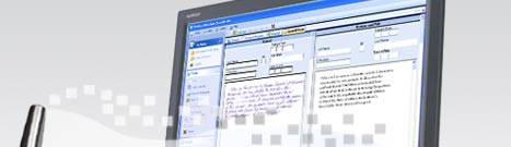 computer monitor showing data bits entering from digital pen